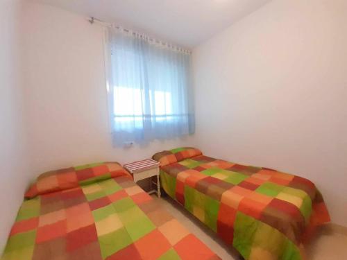 Cama o camas de una habitación en Ayf colomeras espacioso playa morro de gos