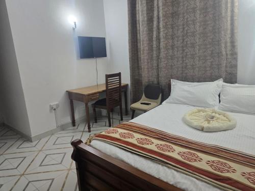 Postel nebo postele na pokoji v ubytování Dianite homes