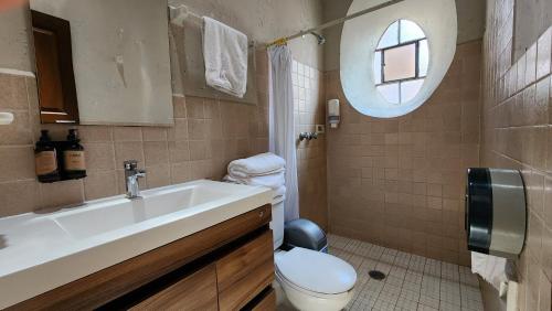 Koupelna v ubytování Hotel Sautto