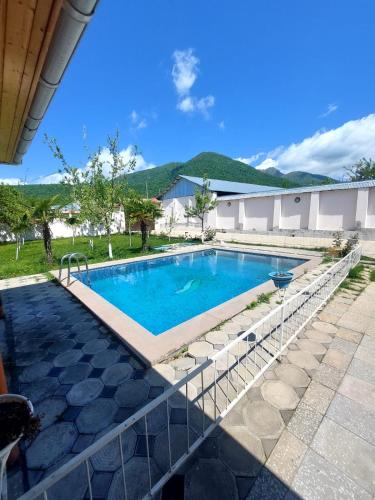 Baseinas apgyvendinimo įstaigoje palma villa arba netoliese