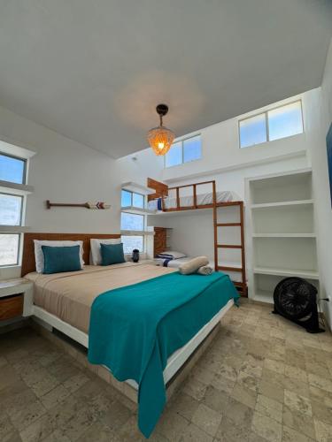 Una cama o camas en una habitación de Casa Tortugas
