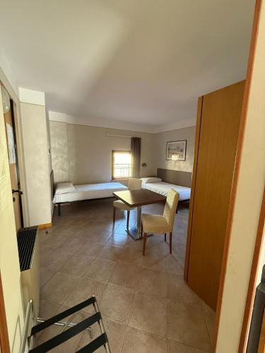 Кровать или кровати в номере Hotel Bel Sito Peschiera