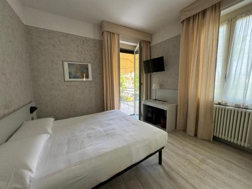 Posteľ alebo postele v izbe v ubytovaní Hotel Bel Sito Peschiera
