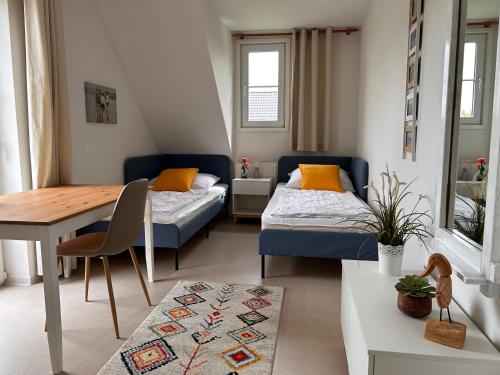 Ένα ή περισσότερα κρεβάτια σε δωμάτιο στο Ferienhaus Auszeit