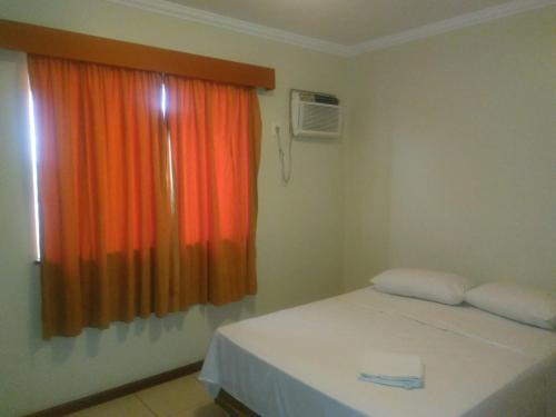 Katil atau katil-katil dalam bilik di Pousada Solar Suites