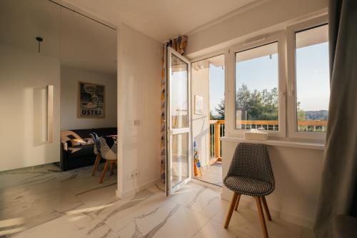 Χώρος καθιστικού στο Apartament Miętowy