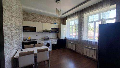 Virtuvė arba virtuvėlė apgyvendinimo įstaigoje palma villa