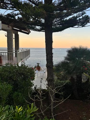 a view of the ocean and a pier at Suite Panoramic in Porticello