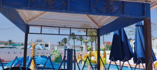 a view of a pool with a water park at Naama wiew- Alle due palme in Sharm El Sheikh