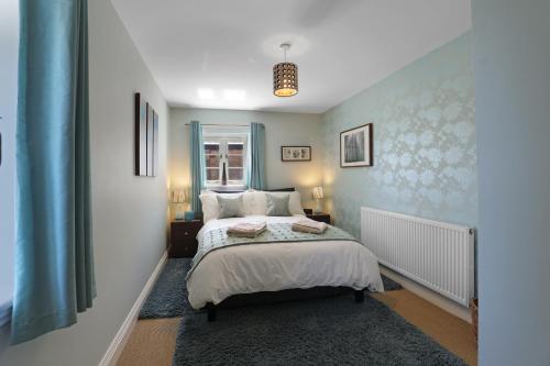 Postel nebo postele na pokoji v ubytování Plumtree Cottage