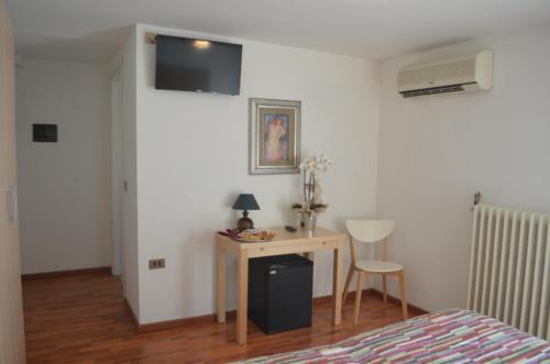 TV a/nebo společenská místnost v ubytování Hotel Paradiso
