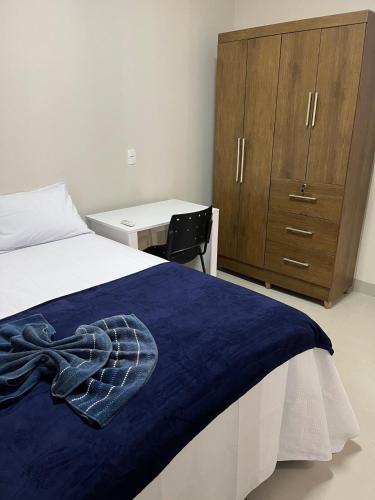 Postel nebo postele na pokoji v ubytování Casa completa e aconchegante com fácil acesso ao aeroporto