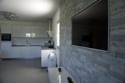 Kuchyň nebo kuchyňský kout v ubytování Villa Vuletic