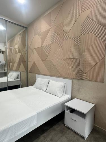 Ένα ή περισσότερα κρεβάτια σε δωμάτιο στο MAGNIT Apartments у самого моря