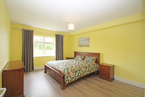a bedroom with a bed and a window at Luxury 2 bedroom apartment in Galway city in Galway