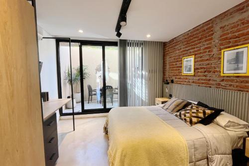 Giường trong phòng chung tại Loft Marina - Loft Frente a Playa Luna Roja, Chapadmalal Para 4 PAX - Hola Sur