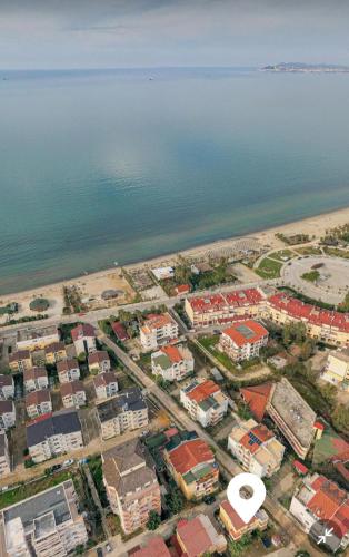 an aerial view of a city next to the water at Ground floor Studio in Golem Next to Hotel Flower self check in 100m to beach in Golem