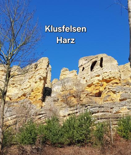 a picture of a mountain with the words kitzenstein harz at Ferienwohnung Pitstop in Oschersleben