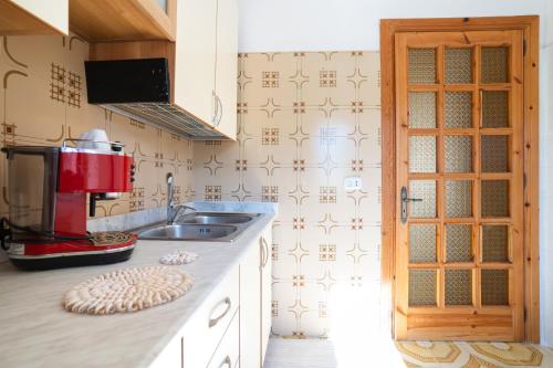 Una cocina o zona de cocina en Portico dei Gradoni