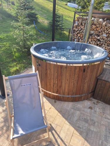 Gambar di galeri bagi Dolina Narie - Domki z Jacuzzi di Bogaczewo