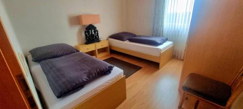 Ένα ή περισσότερα κρεβάτια σε δωμάτιο στο Landhaus Sauerburgblick