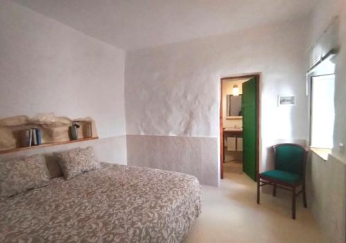 Ένα ή περισσότερα κρεβάτια σε δωμάτιο στο Casa MaCló