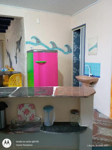a kitchen with a counter top and a sink at Kitnet no Farol Velho in Salinópolis
