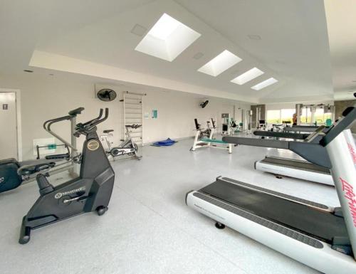 a gym with several treadmills and a treadmill at Búzios Beach Resort in Búzios