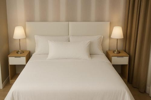 Кровать или кровати в номере Luz y Mar Barcelona