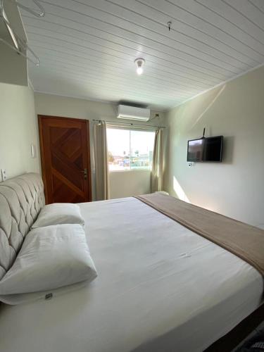 Katil atau katil-katil dalam bilik di Hotel Itapoá