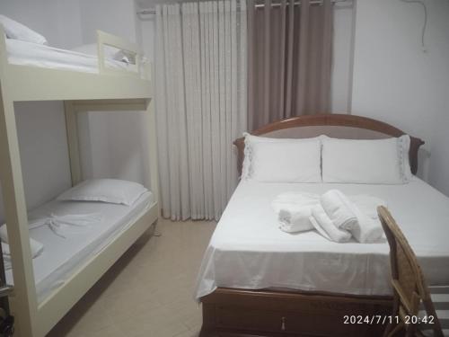 Katil atau katil-katil dalam bilik di Apartment Genti