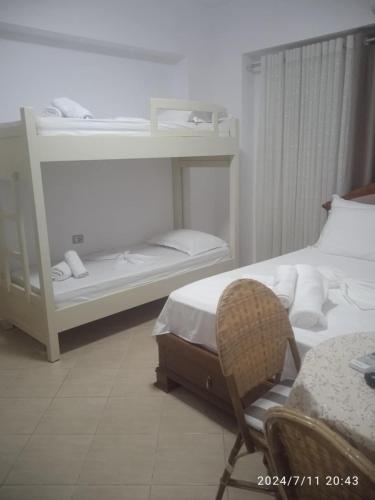 Katil atau katil-katil dalam bilik di Apartment Genti
