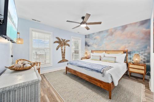 a bedroom with a bed with a painting on the wall at Sunset Shack in Myrtle Beach