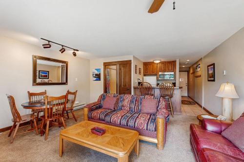 a living room with a couch and a table at The West 3507 in Steamboat Springs