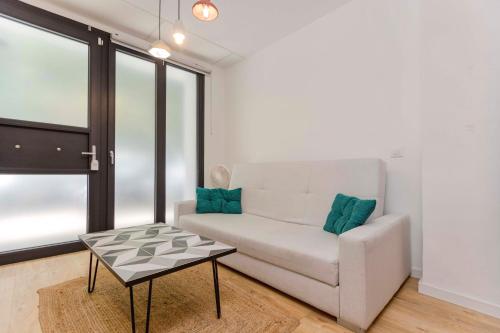 Posezení v ubytování Apartamento acogedor frente a Plaza del Cedro