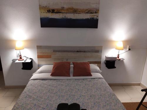Letto o letti in una camera di Pensión El Pozo