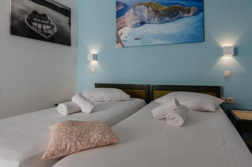 Ένα ή περισσότερα κρεβάτια σε δωμάτιο στο Boutique Seaview Apartments