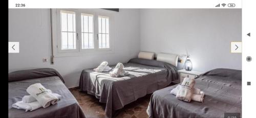 Postel nebo postele na pokoji v ubytování CASA PACA PEREA