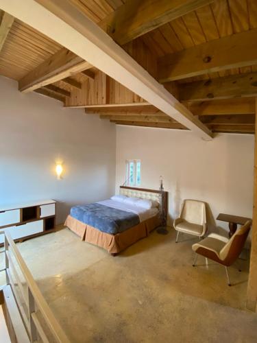 Postel nebo postele na pokoji v ubytování Arco Iris Casa de Campo