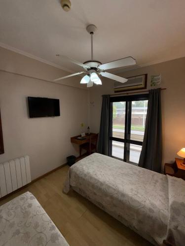 Un ou plusieurs lits dans un hébergement de l'établissement Hotel Escala Uno
