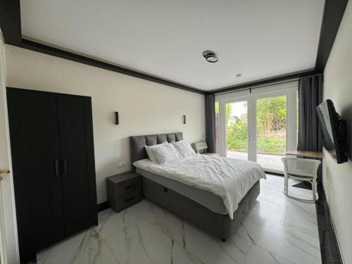 Katil atau katil-katil dalam bilik di B&B Hu Renesse