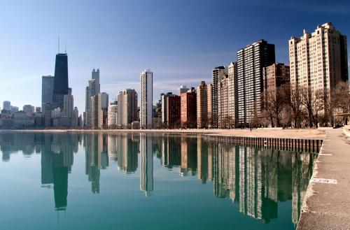 a city skyline with a large body of water at Residence Inn Chicago O'Hare in Rosemont