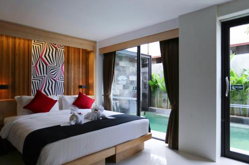 Postel nebo postele na pokoji v ubytování Pavilion Pool Residence Samui - SHA Extra Plus