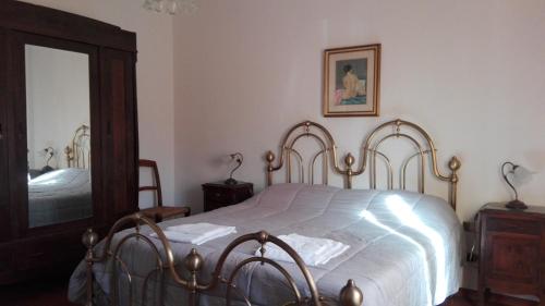Ένα ή περισσότερα κρεβάτια σε δωμάτιο στο Casa Badia