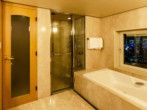Ein Badezimmer in der Unterkunft Ginza Creston