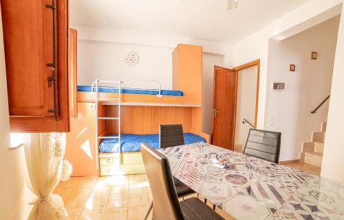 Ένα ή περισσότερα κρεβάτια σε δωμάτιο στο Casa Centro Storico by Cottage sul Mare