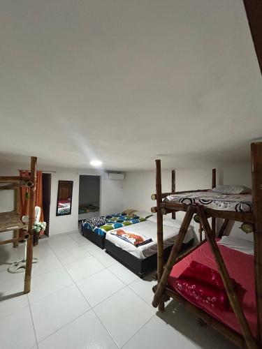 Postel nebo postele na pokoji v ubytování cabaña los corales