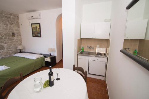 Η κουζίνα ή μικρή κουζίνα στο Posejdon Apartments