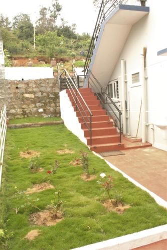 Un jardín fuera de Casa by the hills