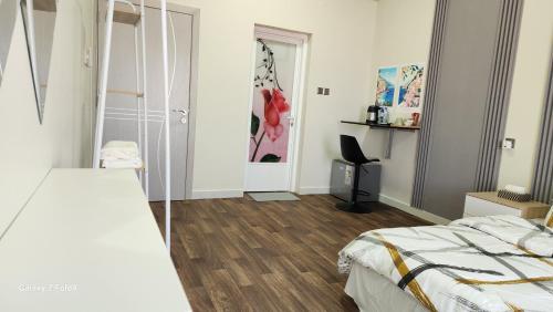 Cama o camas de una habitación en TIWI Venice طيوي ضباب